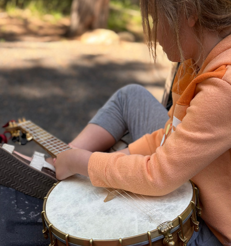Ruby plucking on my banjo